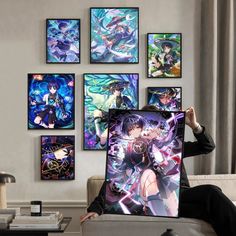 a person sitting on a couch with a laptop in front of them, surrounded by anime pictures