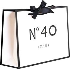 a black and white shopping bag with the number forty on it's front side