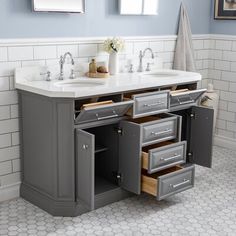 a bathroom vanity with two sinks and three drawers in grey, white and beige colors