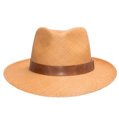 A man of mystery and undeniable style. Designed to help you keep your cool in any situation, with a padded comfort sweatband of exceptional breathability. Made of straw and is the color of toasted wheat, finely handwoven in Ecuador, and completed in the USA with a deep mocha leather hatband. Summer discoveries are waiting. Grab your hat, and get started. Material: 100% Toquilla StrawBrim: 2 3/8"Crown: 4 1/2" teardropClimate: Sun Handwoven in Ecuador. Hand-finished in the US. Measurements are app Classic Brown Panama Hat For Outdoor, Fitted Brown Toquilla Straw Hat, Classic Lightweight Adjustable Hat, Classic Adjustable Lightweight Hat, Classic Outdoor Straw Hat With Adjustable Fit, Classic Straw Hat With Adjustable Fit For Outdoor, Fitted Brown Panama Hat For Travel, Classic Beige Panama Hat For Outdoor, Classic Adjustable Straw Hat For Outdoor