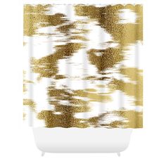 a shower curtain with gold paint on it