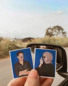 someone holding up two polaroid photos in front of a car window with the image of a man and woman looking at each other