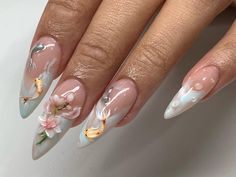 🌸💧 Tranquil Koi Pond Press-On Nail Set | Elegant Almond Nails with 3D Koi and Floral Art 🐟🌿 Dive into serenity with our Tranquil Koi Pond Press-On Nail Set, where each nail is a masterpiece of calm and elegance. Featuring hand-painted koi fish and delicate floral sculptures, this set brings the beauty of a peaceful garden pond to your fingertips. 🐟🌸 Key Features & Highlights: Soft Pastel Palette: Embrace the soothing shades of peach and soft white, designed to replicate the tranquil waters of a koi pond. Perfect for a fresh, serene look. 🎨🌤️ Intricate 3D Artwork: Hand-Painted Koi Fish: Each nail features a beautifully detailed koi fish, symbolizing good fortune and perseverance, swimming across a serene backdrop. 🐟🖌️ Sculpted Floral Details: Delicate 3D flowers in bloom add a tou 21st Nails, Japan Nails, Environmental Posters, Fish Nails, 3d Flower Nails, 2024 Ideas, Nails Today, Aesthetic Board, Neutral Nails