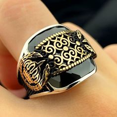 A "men's king ring" can symbolize strength and power in various ways, often drawing inspiration from the imagery and symbolism associated with kingship and royalty.  Ultimately, a men's ring ring serves as a symbolic accessory that embodies the concept of strength and power, drawing inspiration from the regal imagery associated with kings and monarchs. It can be a meaningful piece of jewelry for those who wish to convey a sense of authority, self-assuredness, and personal achievement. When choos Power Drawing, Black Zirconium Ring, Turkish Rings, King Ring, Ring Mens, Onyx Ring, Ring Fit, Men's Ring, Silver Gifts