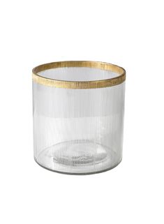 a clear glass container with gold rim