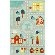 a rug that has different types of houses and trees on it, including the road