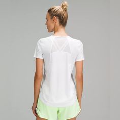 Sprints Anyone? This Lightweight Tee Has Mesh Fabric Panels For Breathability In Sweaty Situations. White Sporty T-shirt For Light Exercise, Casual White Tops For Running, Versatile White Tops For Light Exercise, White Short Sleeve Athleisure Activewear, White Short Sleeve Running Top, White Tops For Light Exercise In Spring, White Short Sleeve Activewear For Spring, Breathable Tops For Spring Running, White Casual Tops For Light Exercise