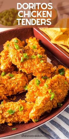 fried chicken tenders on a plate with tortilla chips