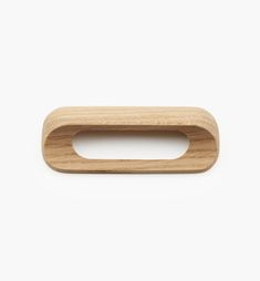 a wooden object on a white background