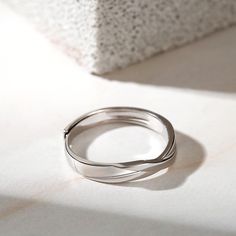 Simple in design, the ring is finished with a bright polished shine. Celebrate your commitment with this meaningful wedding band.Weight: 2.69 gMaterial: 925 SilverPlating Color: Silver Men's Wedding Bands, One Love, Sterling Silver Mens, Mens Band, Silver Man, Mens Wedding Bands, Wedding Men, In Design, Quality Jewelry