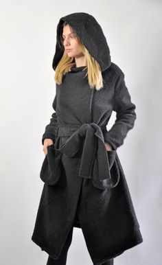 "Black Wool Coat, Hooded Coat, Winter Wool Coat Autumn-winter casual coat. Wool hooded maxi coat. Oversized comfortable coat. Black coat , warm and cozy. The coat has a luxury viscose lining. Model wearing size S. MODEL SIZE bust: 89 cm (34\") waist: 65 cm (25\") Hips: 89 (34\") height:176 cm Care Only Dry Cleaning Shop sizing chart GABYGA SIZE XXS (US 0, UK 4, Italian 34, French 32, German 30, Japan 1) bust: fits bust around 32.5\" / 81cm Waist: fits waist around 25\" / 63.5cm Hips: fits hips a Black Hooded Wool Coat For Winter, Black Wool Hooded Outerwear, Black Hooded Pea Coat For Cold Weather, Winter Coat Black, Belted Wool Coat, Casual Winter Coat, Black Cotton Dresses, Wool Winter Coat, Coat Autumn