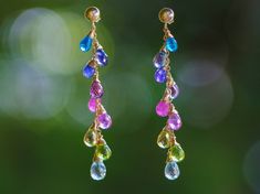 "THE JEWELRY IS SHIPPED via DHL EXPRESS (2-5 days delivery door to door). THE DHL SHIPPING COST IS INCLUDED IN THE PRICE. The Rainbow Lagoon Earrings - Multi Gemstone Colorful Rainbow Earrings Wire Wrapped in Gold Filled ► Measurements / Details: - Length of the earrings including earwires: 2.44\" (~6.2 cm) - Gold: High quality 14K Gold Filled - Silver: High quality Sterling Silver (the posts in silver are round balls) ► Gemstones: The Earrings include excellent AAA quality gemstones, they are n Multicolor Gemstone-accented Fine Jewelry Earrings, Multicolor Gemstone Accented Fine Jewelry Earrings, Elegant Rainbow Earrings, Rainbow Teardrop Jewelry Set With Earrings, Multicolor Gemstone Accent Fusion Earrings, Rainbow Teardrop Jewelry With Matching Earrings, Elegant Rainbow Jewelry With Matching Earrings, Rainbow Elegant Jewelry Set With Matching Earrings, Elegant Rainbow Dangle Jewelry