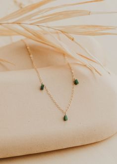 We’re in our Color Era and we’re vibing hard with these colorful stones right now. Gemma Trio is inspired by our Quinate Necklace, just a more colorful version! Three 2x4mm stones drop from our delicate cable chain. Necklace measures 17" + 1" extender. Available in Moss (African Green Jade) + Seafoam (Green Aventurine) + Ash (Black Labradorite). Available in 14kt Gold Fill + Sterling Silver. Shop the entire Gemma Collection. Handmade in Eau Claire, WI. Our jewelry is handmade so each piece will Trio Necklace, Everyday Wear Jewelry, Colorful Stones, Black Labradorite, Jewelry Photoshoot, Cable Chain Necklace, Silver Shop, Green Jade, Jewelry Cleaner