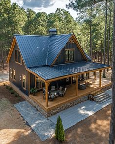 this is an aerial view of a house in the woods