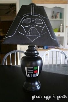 a darth vader lamp on top of a table