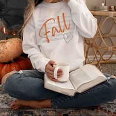 Cozy up for fall with this adorable women's fall words sweatshirt. Perfect for casual wear with a pair of jeans. Ideal for any situation, a unisex heavy blend crewneck sweatshirt is pure comfort.  These garments are made from polyester and cotton.  This combination helps designs come out looking fresh and beautiful.  The collar is ribbed knit, so it retains its shape even after washing.  There are no itchy side seams on these sweaters.  .: 50% cotton, 50% polyester .: Medium-heavy fabric (8.0 oz Boho Sweaters, Autumn Wear, Fall Graphic, Tee Shirt Fashion, Winter Love, Sweatshirt Cute, Winter Layering, Winter Sweatshirt