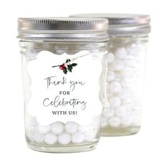 two glass jars filled with white candies