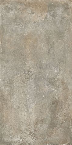 an old cement wall textured with white paint