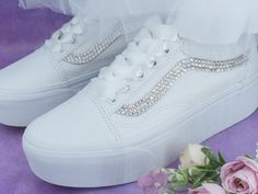 Perfect wedding sneakers to dance the night away in. Very comfortable, super sparkly and elegant, with the added benefit of a discreet platform. Once the day is over, wear them again and again for that added touch of luxury with any outfit. Custom hand embellished platform Old Skool Vans. Embellished with the finest crystals to inner and outer brand panels and finished with luxurious satin ribbon lace ties. These can be personalised on request and ribbon colour changed to compliment your colour Old Skool Platform Vans, Vans Wedding, Wedding Trainers, Comfy Wedding Shoes, Wedding Vans, Tennis Vans, Old Skool Platform, Platform Vans, Old Skool Vans