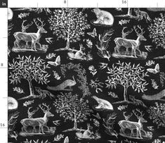 a black and white drawing of animals in the woods with trees on it's side