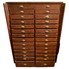 an old wooden dresser with many drawers