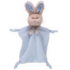 a stuffed rabbit in a blue blanket with its arms spread out to the side and eyes closed