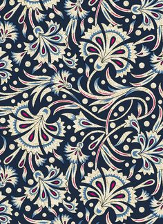 a blue and white floral pattern with red, white, and blue flowers on it