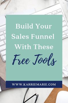 the words build your sales funnel with these free tools in front of a computer keyboard