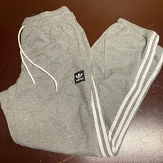 Adidas Mens Gray Heather Insley Elastic Waist Zip Pocket Sweatpants Size Medium Brand: Adidas Department: Men Size: M Color: Gray Type: Pants Style: Sweatpants Pattern: Heather Theme: Sports Occasion: Activewear Season: Fall, Winter Features: Comfort, Elastic Waist Pockets Condition: New With Tags I Offer Discounts For All Return Customers. - Jvs Casual Relaxed Fit Sweatpants With Three Stripes, Adidas Relaxed Fit Casual Sweatpants, Adidas Cotton Sweatpants With Elastic Waistband, Adidas Sporty Sweatpants With Pockets, Casual Adidas Sweatpants For Loungewear, Adidas Relaxed Fit Cotton Pants, Adidas Casual Joggers With Pockets, Adidas Cotton Athleisure Joggers, Adidas Athleisure Sweatpants With Pockets