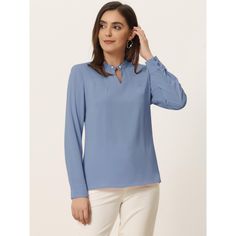 This blouse is both elegant and versatile, making it the perfect addition to your wardrobe. The pleated mock neck adds a touch of sophistication, while the pearl decor design adds a subtle yet stylish element. You can wear it on a variety of occasions, including casual outings, dates, office meetings, formal events, and daily wear. Pair it with pants or skirts for a chic and effortless look that is both comfortable and stylish. This blouse is sure to become a go-to piece in your collection. Elegant Collared Tops In Solid Color, Elegant Solid Color Blouse For Office Wear, Elegant Formal Solid Color Tops, Elegant Solid Color Blouse For Business Casual, Chic Band Neckline Tops For Work, Elegant Band Neckline Tops For Workwear, Chic Tops With Band Neckline For Workwear, Chic Workwear Tops With Band Neckline, Elegant Business Casual Solid Color Blouse