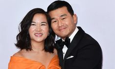 Ronny Chieng’s wife is Hannah Pham, an Australian-Vietnamese lawyer and filmmaker. The couple married in 2016 and currently reside in New York City. Ronny Chieng’s wife, Hannah Pham, is a successful lawyer and producer. She often supports him at events and shares his sense of humor. Hannah’s background is impressive, and she balances her career with her role as a supportive partner. Their relationship offers a glimpse into a couple’s life, balancing fame and normalcy. Fans are always eager to... Successful Lawyer, Supportive Partner, Net Worth, Lawyer, Filmmaking, York City, New York City, Sense