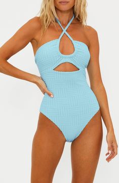 Feel your best on land and at sea in this textured one-piece fashioned with sunny cutouts and a halter neck. Ties at neck Halter neck Moderate back coverage 96% polyester, 4% spandex Machine wash, tumble dry Imported Textured Swimwear For Spring And Summer, Textured Swimwear For Summer, One-piece Textured Swimwear For Poolside, Textured Beachwear Swimwear For Poolside, Textured One-piece Swimwear For Poolside, Textured Sleeveless Swimwear For Vacation, Textured Swimwear For Poolside, Textured Swimwear For Beach, Blue Textured Swimwear For Swimming