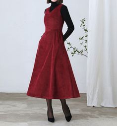 "★★FEATURES Corduroy Fabric Polyester lining Two side pockets Back zipper closure V neckline Sleeveless corduroy dress Perfect for winter, autumn, spring Dry clean ★★ The model is 170 cm (5′ 7″) tall with a 80 cm (31.5\") bust, 66 cm (26\") waist. She is wearing the dress in size XS. ★★Bespoke Order Service If you Request other color Request the length Your height is not between 155 cm- 175 cm Your weight is not between 47 kg -77 kg I can do it for you, It will need some extra fee depending on o Velvet A-line Dress For Winter, Casual Sleeveless Corduroy Dress, Red Velvet Dress For Winter, Burgundy Sleeveless Dress For Fall, Sleeveless Burgundy Dress For Fall, Burgundy Sleeveless Fall Dress, Red Velvet Winter Dress, Red Sleeveless Midi Dress For Fall, Sleeveless Red Midi Dress For Fall