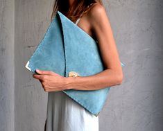 "Soft Symmetria Clutch in jeans blue. The perfect bag for all occasions! Ideal for cocktail and parties or for business meetings depending the size you choose. It comes in two sizes, small and large. You can use it as a chic briefcase for your work or as a modern large clutch for a night out. This adorable large clutch is handmade out of a genuine, lux Italian jeans blue suede leather. -Small size fits all your essentials, wallet, keys, mobile, cosmetics etc. -Large size fits a 15\" laptop, ipad Blue Envelope Clutch For Everyday Use, Modern Clutch, Formal Bag, Suede Clutch, Large Clutch, Suede Handbags, Envelope Clutch, Business Bag, Yellow Leather