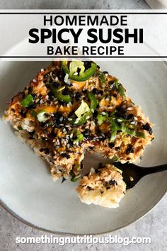 homemade spicy sushi bake recipe on a white plate with a black serving spoon