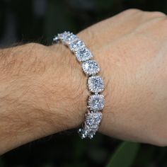 Stand out with these quality tennis bracelets! Premium 14k White Gold Plated Clustered Diamond Tennis link Bracelet! -Plating is PVD which is the highest quality. -Stones are high quality VVS simulated lab diamonds(CZ)! Hand prong set and not glued in like the cheap ones! -10mm wide -Nice weight to it. -Brass base. -7 or 8 inch options. -Comes in gift box. FAST SHIPPING!*TRUSTED SELLER**4000+ TRANSACTIONS* -Very good quality bracelet. Looks even better in person. -For men and women. -Check out m Diamond Tennis Bracelet Iced Out For Anniversary, Anniversary Diamond Tennis Bracelet Iced Out, Iced Out Diamond Tennis Bracelet For Anniversary, Classic Iced Out Tennis Bracelet For Anniversary, Classic Iced Out Tennis Bracelet As A Gift, Classic Iced Out Tennis Bracelet For Gift, Classic Iced Out Tennis Bracelet As Gift, Classic Iced Out Tennis Bracelet Gift, Diamond White Iced Out Tennis Bracelet For Anniversary