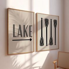 two framed art pieces with the words lake and spoons are hanging on a wall