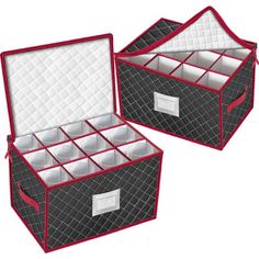 two black and white boxes with red trims on the sides, one is open