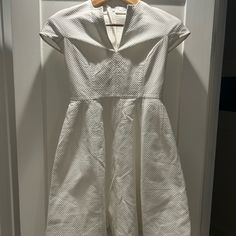 Christian Dior White Dress Classic Spring Dress With Structured Fit, Classic Structured Dresses For Spring, Elegant White Lined Midi Dress, Lined A-line Midi Dress For Wedding, A-line Midi Wedding Dress, Wedding A-line Midi Dress, A-line Wedding Midi Dress Lined, White Structured Midi Dress For Spring, Formal Spring Structured Dress