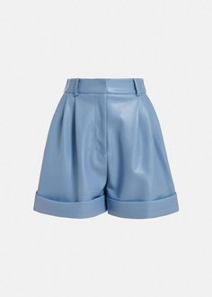 Transform your wardrobe with the Essentiel Antwerp Falcons Faux Leather Shorts in Feeling Blue. The butter-soft faux leather material adds a touch of luxury, while the pleated front detailing and fixed folded hem add a sophisticated touch. With two welt pockets at the back and slanted front pockets, these high-waisted shorts are both practical and fashionable. Elevate any outfit with these versatile and polished shorts. Fabrication: 100% Polyurethane, base 100% Recycled Polyester, lining 100% Le Trendy High-waisted Leather Shorts, Chic High Waist Leather Shorts, Chic High-waist Leather Shorts, Spring Faux Leather Bottoms With Built-in Shorts, Trendy Leather Shorts For Workwear, High-waisted Faux Leather Shorts For Summer, High-waisted Faux Leather Shorts With Built-in Shorts, Elegant Leather Shorts, Faux Leather Shorts With Belt Loops For Summer