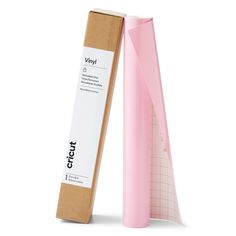 a pink paper roll and cardboard box on a white background with the word vinyl printed on it