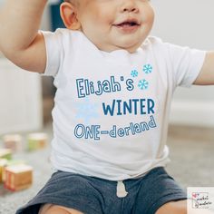 "Step into a magical world of snowflakes and joy as you celebrate your little one's first birthday with our enchanting \"Baby's Winter One-derland\" custom shirt. This personalized snowflake-themed tee captures the beauty of the season and adds a touch of frosty elegance to your baby's milestone celebration. How to Order: -Choose the size and color of the shirt from the dropdown menus. -In the \"Personalization\" section, please provide your child's name and color theme for customization. -Add to cart and proceed to checkout. Our unique and eye-catching shirts are crafted using the latest DTG (Direct-to-Garment) technology, ensuring high-quality prints that capture every detail of our designs. While we take immense care to maintain color accuracy in our products, it's important to remember 1st Birthday Winter, Winter First Birthday, Winter Onederland First Birthday, Toddler Printables, Onederland Party, Winter Onederland Party, Kids Birthday Shirts, First Birthday Shirt, 1st Birthday Shirts