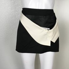 Helmut Lang Woman Mini Skirt Black & White Belt Front Design Sz 2 Dm14 Material Leather Lining Material Polyester, Spandex Elegant White Asymmetrical Skort, White Asymmetrical Chic Skort, Chic White Asymmetrical Skort, White Asymmetrical Skirt For Night Out, White Asymmetrical Skort For Day Out, Fitted Black And White Skirt For Spring, Chic White Skort For Night Out, Chic Fitted Black And White Skirt, White Lined Skort For Night Out