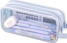 a clear bag with lots of pens and pencils in it