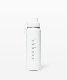 a white insulated water bottle with the word intention printed on it, against a white background