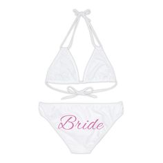 This two piece swimsuit is perfect for your Bachelorette party or vaca! Perfect gift for your bride-to-be!!  Match with your Bridesmaids PLEASE NOTE Due to health reasons,  we DO NOT accept returns or exchanges on swimwear!!  nMade with 4-way stretch Tricot (82% Microfiber, 18% Spandex), this strappy bikini set is the perfect companion to all summer escapades. With adjustable elastic straps for a perfect fit, this complete two-piece swimsuit needs your custom art to become an instant summer hit.  .: Material: 82% microfiber polyester, 18% spandex .: Medium fabric (7.5 oz /yd² (250 g/m .: Two piece swimsuit .: 7 strap colors to choose from .: Adjustable elastic straps .: Removable cups .: Assembled in the USA from globally sourced parts .: Seam thread color automatically matched to design ( Bachelorette Party Beachwear Swimwear For Summer, Beachwear Swimwear For Bachelorette Party In Summer, Summer Beachwear For Bachelorette Party, Beachwear For Bachelorette Party In Summer, Fitted Swimwear For Bachelorette Party Beach Season, White Swimwear For Beach Wedding, Bride Swimsuit, Bachelorette Party Bride, Two Piece Swimsuit