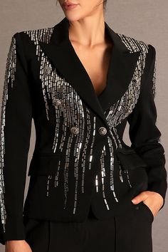 Elevate your wardrobe with the Faidra Rhinestone Double-Breasted Lapel Blazer, a stunning piece that merges classic sophistication with dazzling modern details. This tailored blazer features a timeless double-breasted design with sharp lapels, enhanced by shimmering rhinestone embellishments that catch the light with every move. The structured fit and refined cut provide a polished silhouette, while the sparkling accents add a touch of glamour and individuality. Perfect for both professional set Elegant Embellished Evening Blazer, Elegant Evening Embellished Blazer, Tailored Elegant Blazer For Gala, Elegant Tailored Blazer For Gala, Luxury Embellished Blazer With Notch Lapel, Fitted Embellished Outerwear With Notch Lapel, Elegant Embellished Outerwear With Notch Lapel, Glamorous Tailored Evening Blazer, Elegant Evening Blazer With Rhinestones