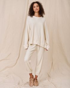 Inspired by a favorite vintage sweatshirt, this wear-with-everything piece has extra slouch, a straight shape, and fuller sleeves than The College Sweatshirt. 100% Cotton Machine Wash Cold Tumble Dry Low Made in the U.S.A. Relaxed Fit Raglan Sleeve Tops For Loungewear, Cream Relaxed Fit Sweatshirt For Everyday, Relaxed Fit Cream Sweatshirt For Everyday, White French Terry Sweats For Loungewear, Slouchy Casual Sweater For Loungewear, Soft-washed Solid Color Sweats For Loungewear, Solid Color Soft-washed Sweats For Loungewear, Solid Soft-washed Sweats For Loungewear, Soft-washed Sweater For Loungewear