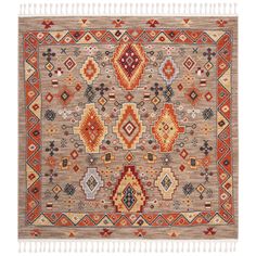 an orange and brown rug with many different designs on it's sides, including fringes