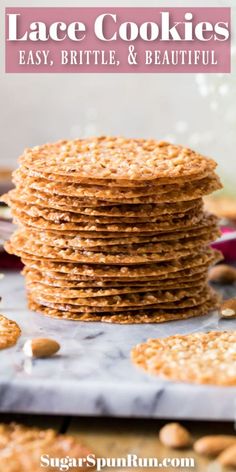 a stack of cookies with almonds on top